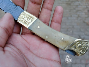 Folding Pocket Knife with bone and brass Handle.