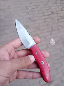 Handmade skinner knife with colour wood handle.
